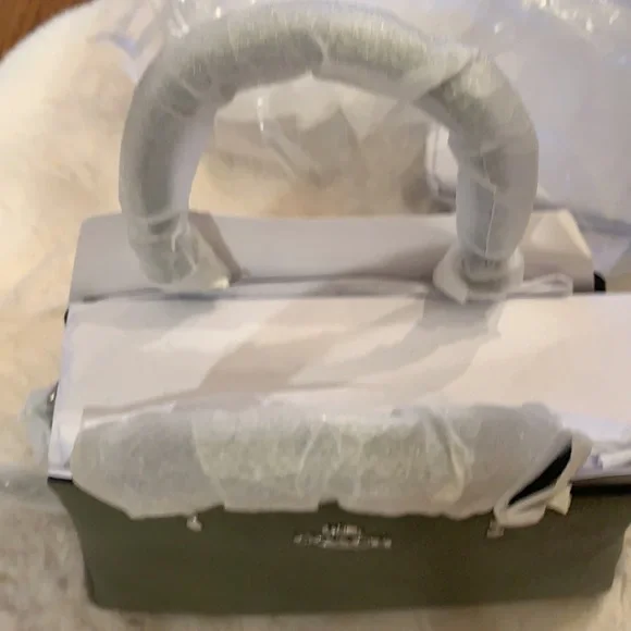 NWT. Coach Minicarryall - Picture 3 of 7